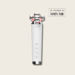 Halio RevitaWave skincare wand with four treatment heads and red lights, labeled EMS, RF, VR, and LED; As Featured in Vanity Fair