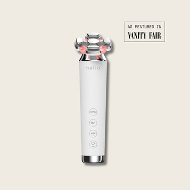 Halio RevitaWave skincare wand with four treatment heads and red lights, labeled EMS, RF, VR, and LED; As Featured in Vanity Fair