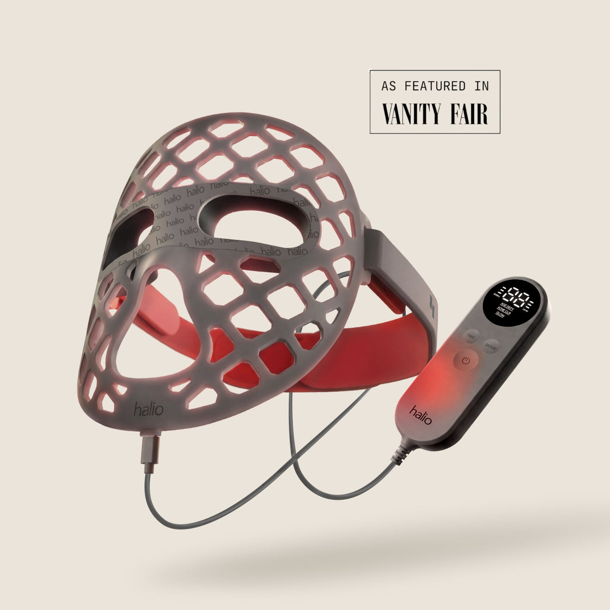 Halio PureGlow Ultralite Silicone LED Face Mask Pro with handheld controller, glowing red, plus “As Featured in Vanity Fair” text