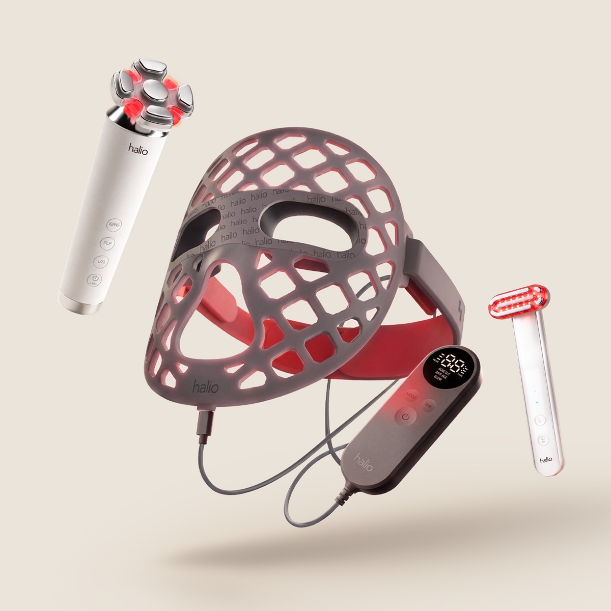 Halio Total Ritual Trio with silicone LED face mask, handheld skin rejuvenator, red light therapy device, and controller.
